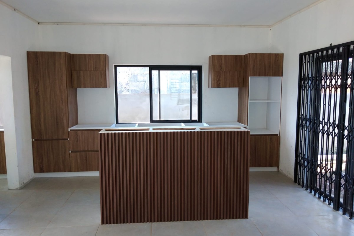 Walnut kitchen with ribbed island