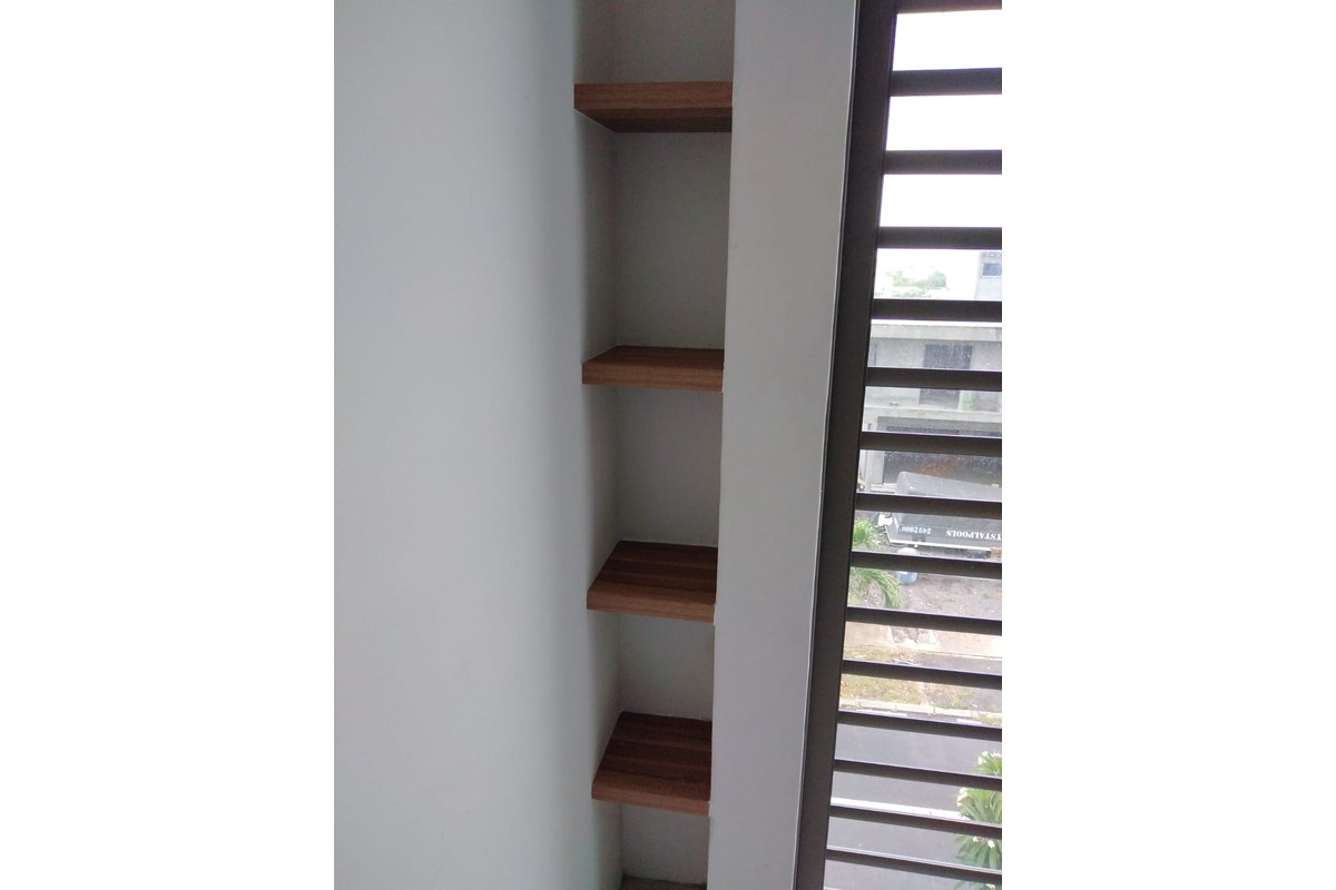 Full-height walnut wardrobe