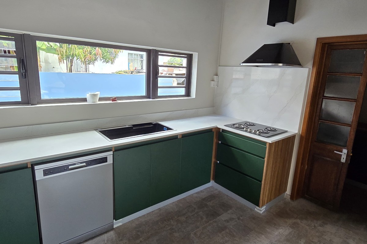 Green kitchen wide view
